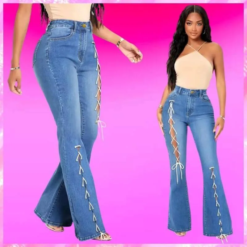 High-waisted bell bottom jeans featuring lace-up detailing along the sides.