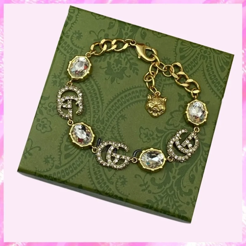 designer monogram gg clear gem gold tone bracelet product detail
