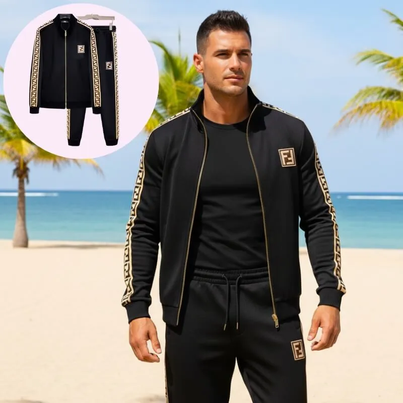 Model wearing athletic full zip tracksuit set with side logo trim in black