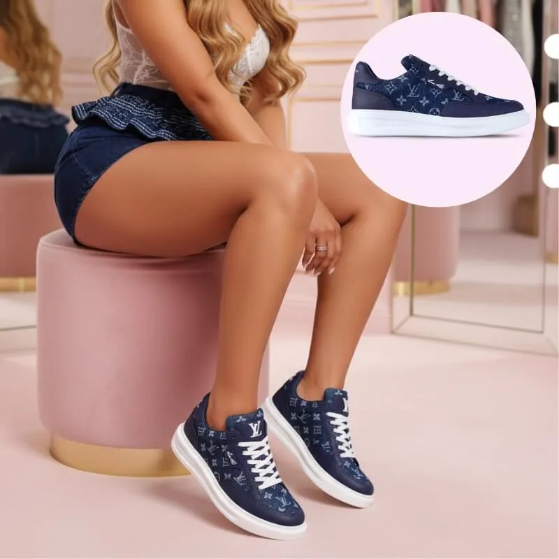 Model wearing high end denim trainers in blue