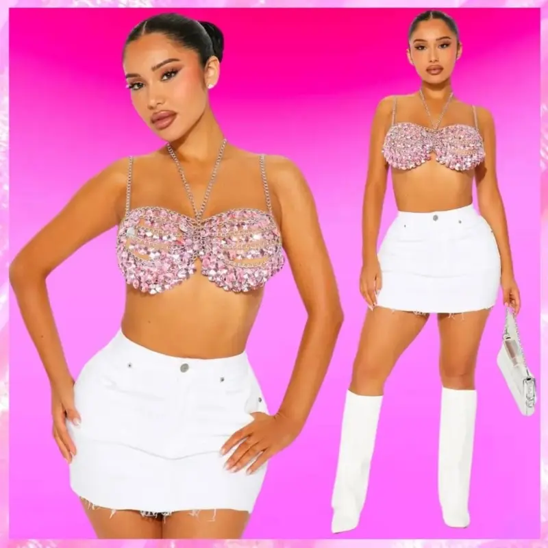 Model wearing madeline festival body chain top in pink women’s statement chain top for parties & concerts