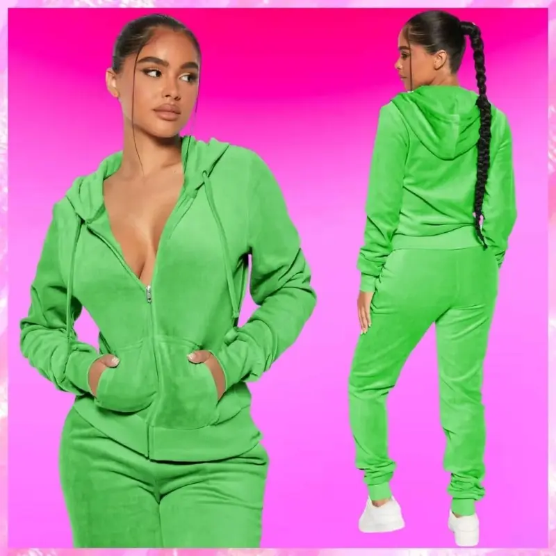 Woman wearing a green velour tracksuit with a hood, viewed from the back.