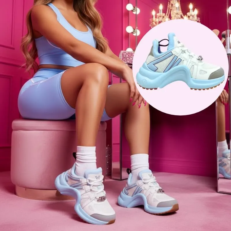 Model wearing monogram arch sole sneakers – in blue