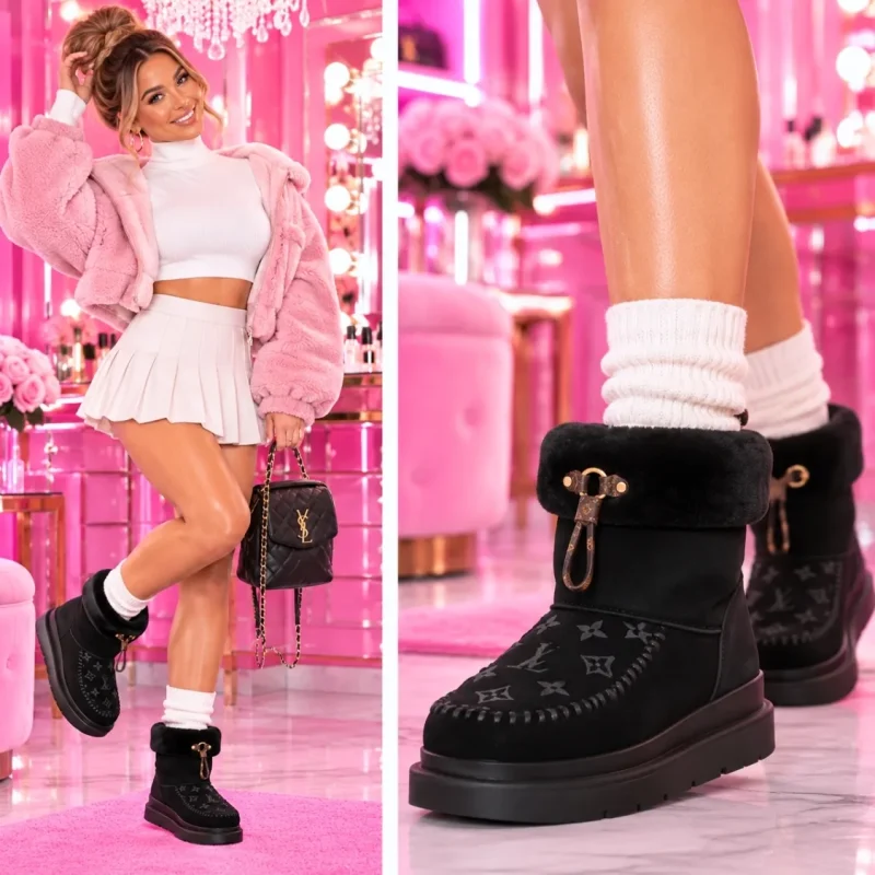 Model wearing women’s monogram platform winter boots in black